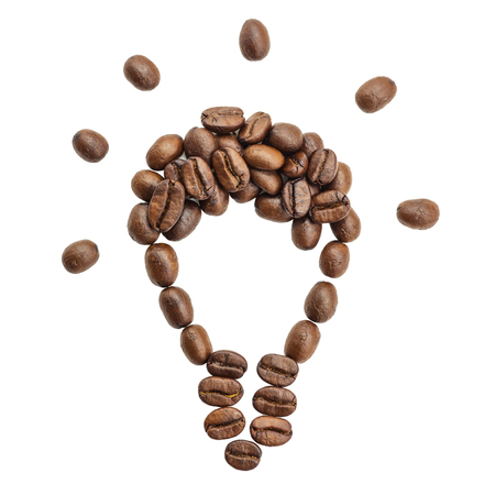 Roasted coffee beans put a lamp on a white background, with clipping path.の写真素材