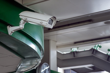 CCTV cameras recorded a white movement. Mounted on the wall above the walkway.