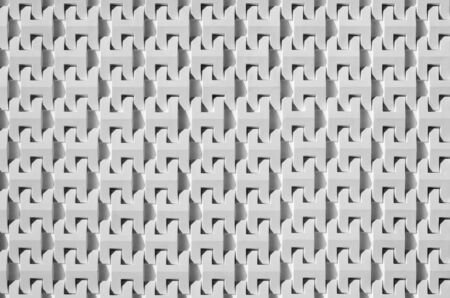 Beautiful white wall The block-shaped "H" arranged on the wall.の写真素材