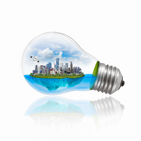 Light bulb with Environmentally friendly energy, isolated on white with clipping path.の写真素材