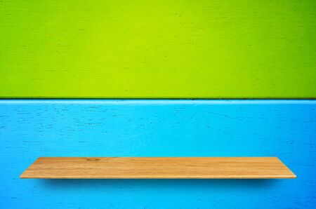 Top wooden shelves and wooden wall background - For product display.の写真素材
