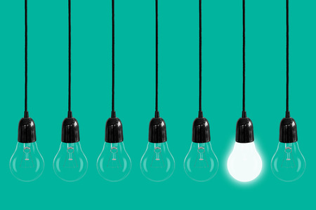 Light bulb on green background, Concept think ideas.の写真素材