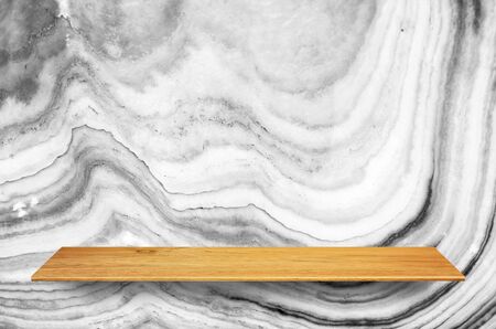Top wooden shelves and marble wall background - For product display.の写真素材