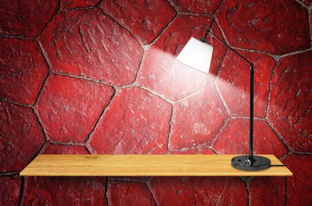Bookshelf on the wall with lamp - For product display.の写真素材
