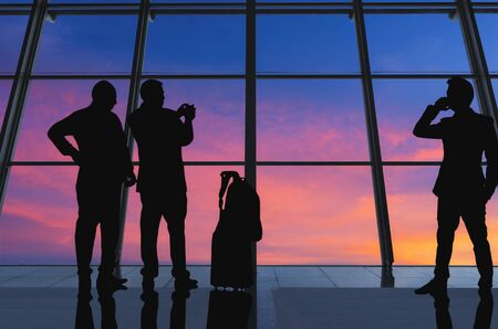 Silhouettes Of Business People Waiting In Airport Terminal.の写真素材