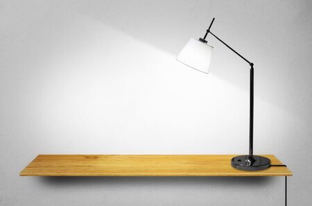 Bookshelf on the wall with lamp - For product display.の写真素材