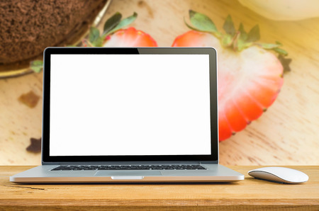Conceptual workspace, Laptop with blank screen on table.の写真素材