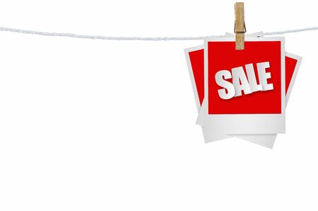 Sale paper label in photo frame paper hanging on white background, discount banner.の写真素材