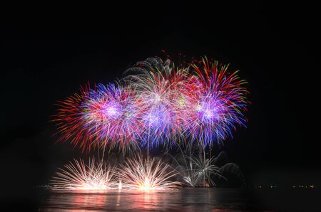 Colorful fireworks on the black sky background.の写真素材