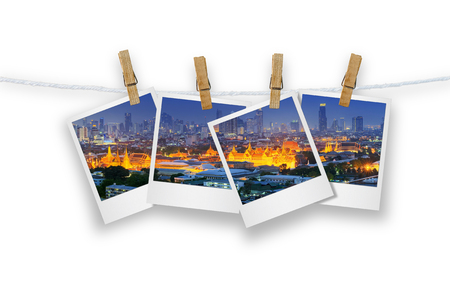 Blank photo frame  with clothespin hanging, photo cityscape skyscrapers of Bangkokの写真素材