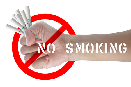 Male hand holding a cigarette, Isolated on white backgroundの写真素材