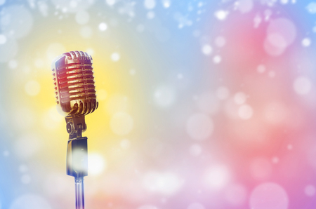 Vintage microphone on wall blurred background.の写真素材