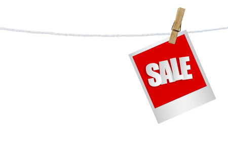 Sale paper label in photo frame paper hanging on white background, discount banner.の写真素材