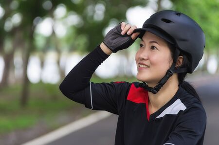 Bike Helmet - Asian women wearing helmets prepared cyclists.の写真素材
