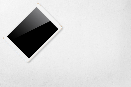 Digital tablet computer with isolated screen with clipping path on white concrete background.の写真素材