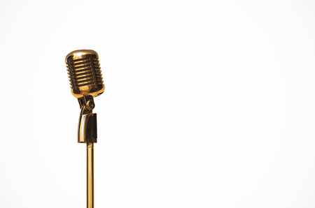 Gold vintage microphone in the studio on whiteの写真素材