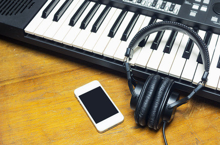 Modern Music equipment on wooden background copy space.の写真素材
