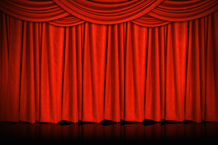 Red curtains and wooden stage floor.の写真素材