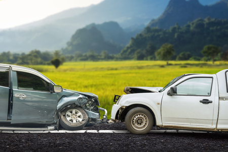 car crash accident on street, damaged automobiles after collision on the road.の写真素材