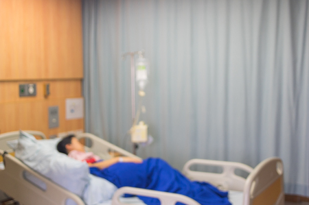 Blur patient on bed in room hospital, idea for background.の写真素材
