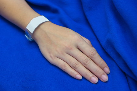Blank labels on the wrists of patients.の写真素材