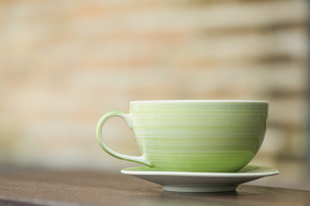 Green tea cup and blurred background with copy space.の写真素材