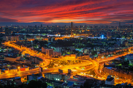 Aerial view of traffic Arun Amarin Intersection with Rama VIII Bridge at sunrise in Bangkok, Thailand.の写真素材