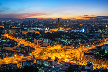 Aerial view of traffic Arun Amarin Intersection with Rama VIII Bridge at sunrise in Bangkok, Thailand.の写真素材