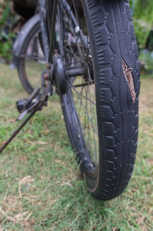 Tire breaks, swelling, danger signals, warning time to change tires.の写真素材