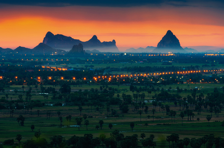 Landscape, mountains, fields and towns Beautiful sunset of Phetchaburi.の写真素材
