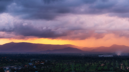 Landscape, mountains, fields and towns Beautiful sunset of Phetchaburi.の写真素材