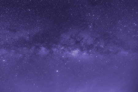 Ultra violet tone, Milky way galaxy with stars and space dust in the universe, long speed exposure,...