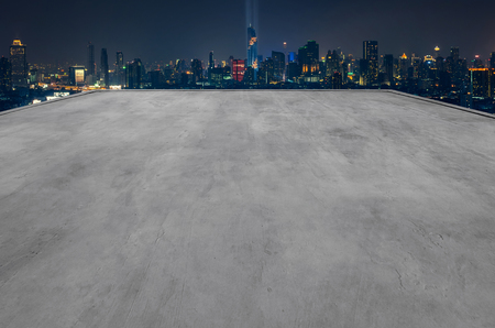 Empty rooftop of the building is perfect for showcase with modern cityscape background.の写真素材