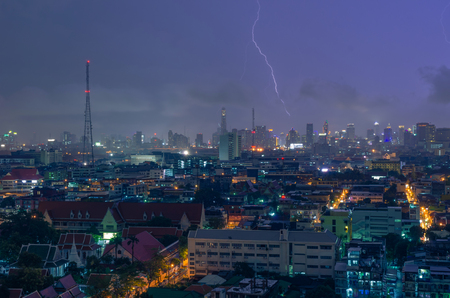 Scenery of Bangkok city on rainy and lightning stormy night.の写真素材
