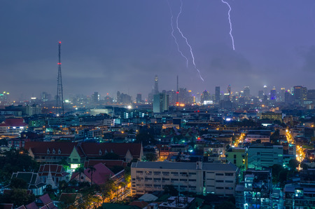 Scenery of Bangkok city on rainy and lightning stormy night.の写真素材