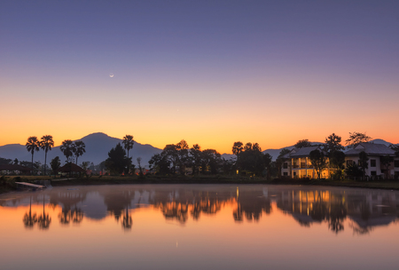 Landscape view of dutch farm, Chiang mai during sunrise with the Mountains in the background, Beautiful colors with reflection.の写真素材