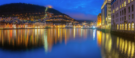 Panorama Famous Bryggen street with wooden colored houses in Bergen at twilight, Norway.の写真素材