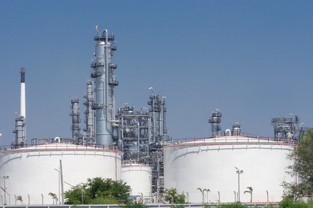 Pipes, chimneys of oil refinery. With the sky as a backdrop.の写真素材