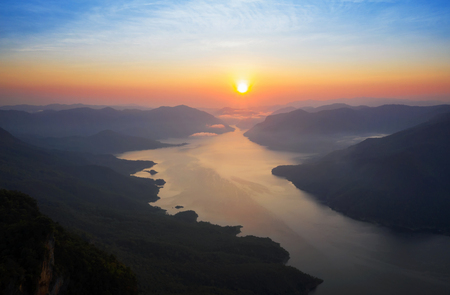 Aerial view, Landscape mountain scenery and water in the dam at sunrise on mountain pha daeng luang, Mae Ping National Park.の写真素材
