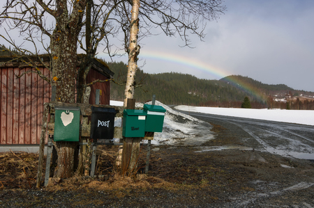 Norwegian mail boxes in Norway view of scenic Lofoten Islands archipelago winter scenery, Beautiful mountain landscape in winter Norway, Scandinavia.の写真素材