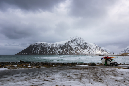Beautiful Skagsanden beach view of scenic Lofoten Islands archipelago winter scenery, Beautiful mountain landscape in winter Norway, Scandinavia, Famous surfing spot.の写真素材