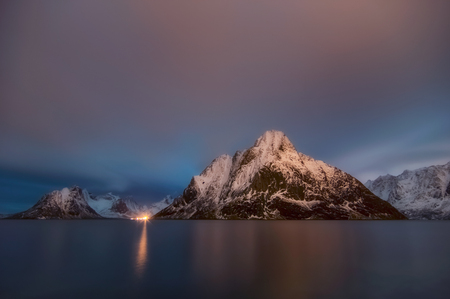 Beautiful Mt. Olstinden in Moskenes view of scenic Lofoten Islands archipelago winter scenery, Beautiful mountain landscape in winter Norway, Scandinavia.の写真素材
