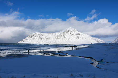Beautiful Skagsanden beach view of scenic Lofoten Islands archipelago winter scenery, Beautiful mountain landscape in winter Norway, Scandinavia, Famous surfing spot.の写真素材