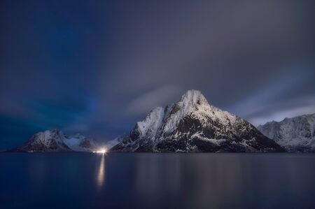 Beautiful Mt. Olstinden in Moskenes view of scenic Lofoten Islands archipelago winter scenery, Beautiful mountain landscape in winter Norway, Scandinavia.の写真素材