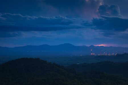 Aerial view of the Twilight coal-fired power plant with lightning and smoke caused by steam above the plant.の写真素材