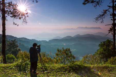 Tourists are taking pictures of the morning scenery of Doi Luang Chiang Dao from Doi Kham Fah Viewpoint, Pha Daeng National Park, Chiang Mai Province.の写真素材