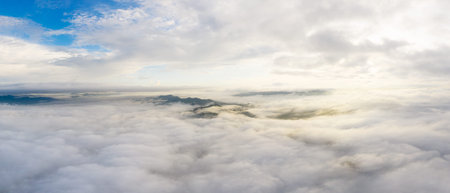Nature beautiful, Aerial view Panoramic Fog and clouds over Mountains at sunrise in autumn Mae Moh,...