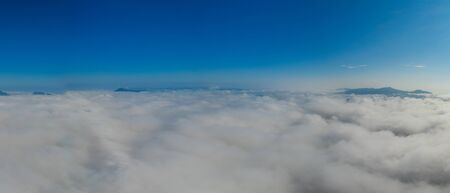Nature beautiful, Aerial view Panoramic Fog and clouds over Mountains at sunrise in autumn Mae Moh, Lampang Thailand.の写真素材