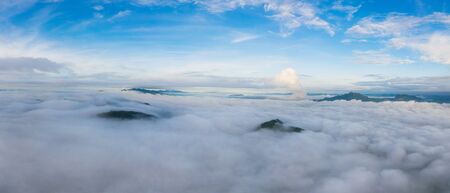 Nature beautiful, Aerial view Panoramic Fog and clouds over Mountains at sunrise in autumn Mae Moh, Lampang Thailand.の写真素材