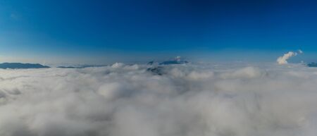 Nature beautiful, Aerial view Panoramic Fog and clouds over Mountains at sunrise in autumn Mae Moh, Lampang Thailand.の写真素材